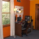 A home office desk with a computer
