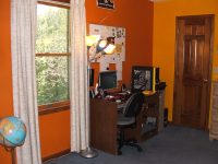 A home office desk with a computer
