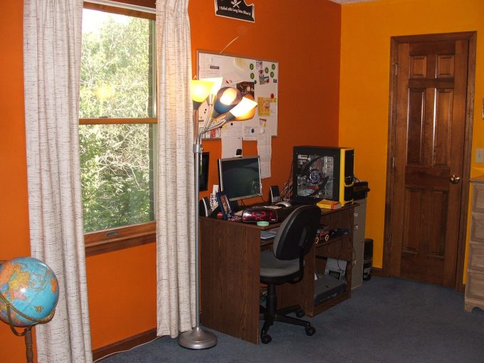A home office desk with a computer
